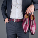 Plum-toned leather belt for an elegant and sophisticated style